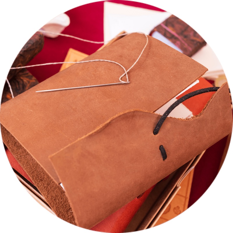 Leather, needle and thread for craft work